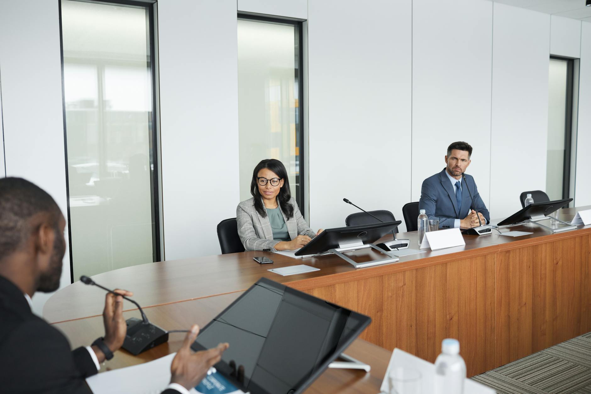 European Union leaders sit around a large table in Brussels during an emergency summit addressing geopolitical and financial crises.