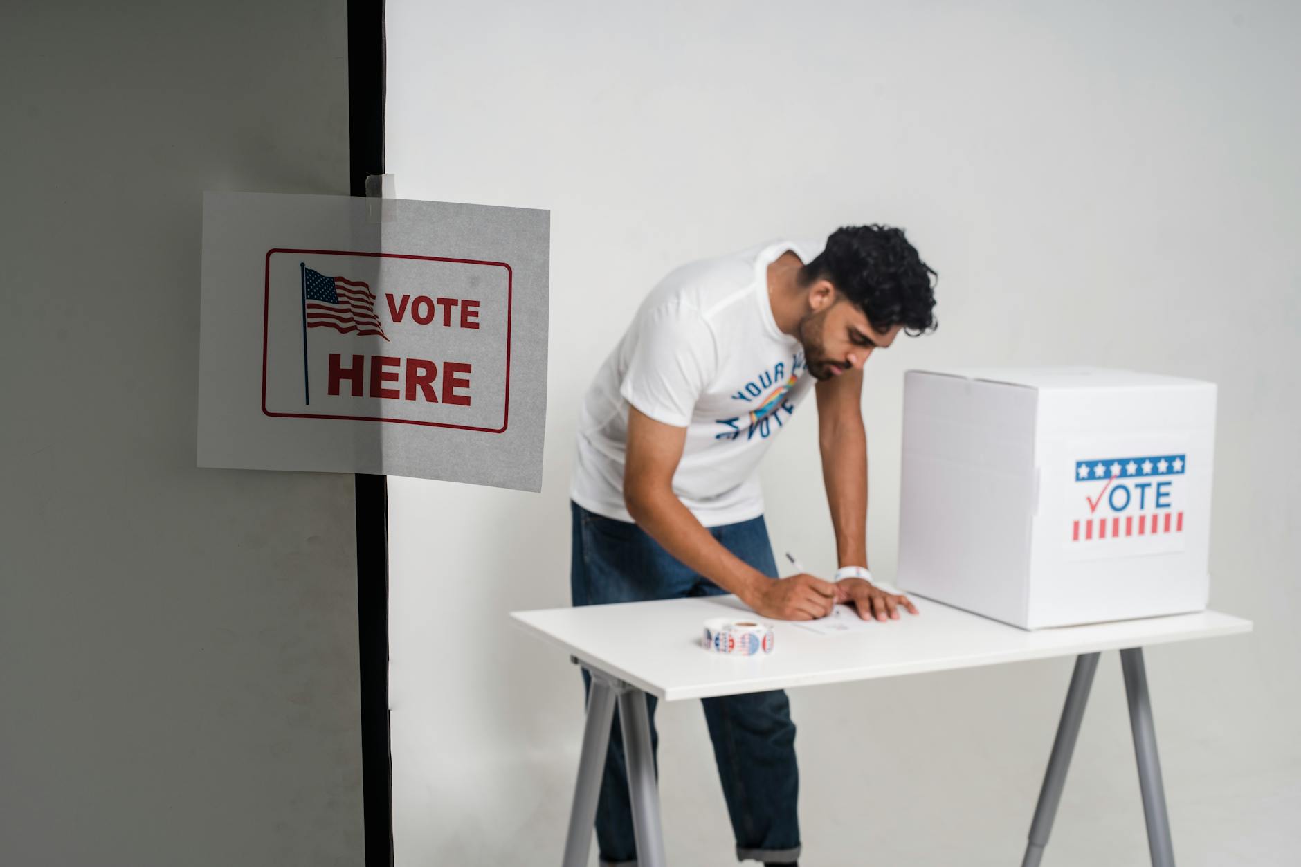 Italian voters cast ballots at a polling station during a nationwide constitutional referendum on judicial reform.
