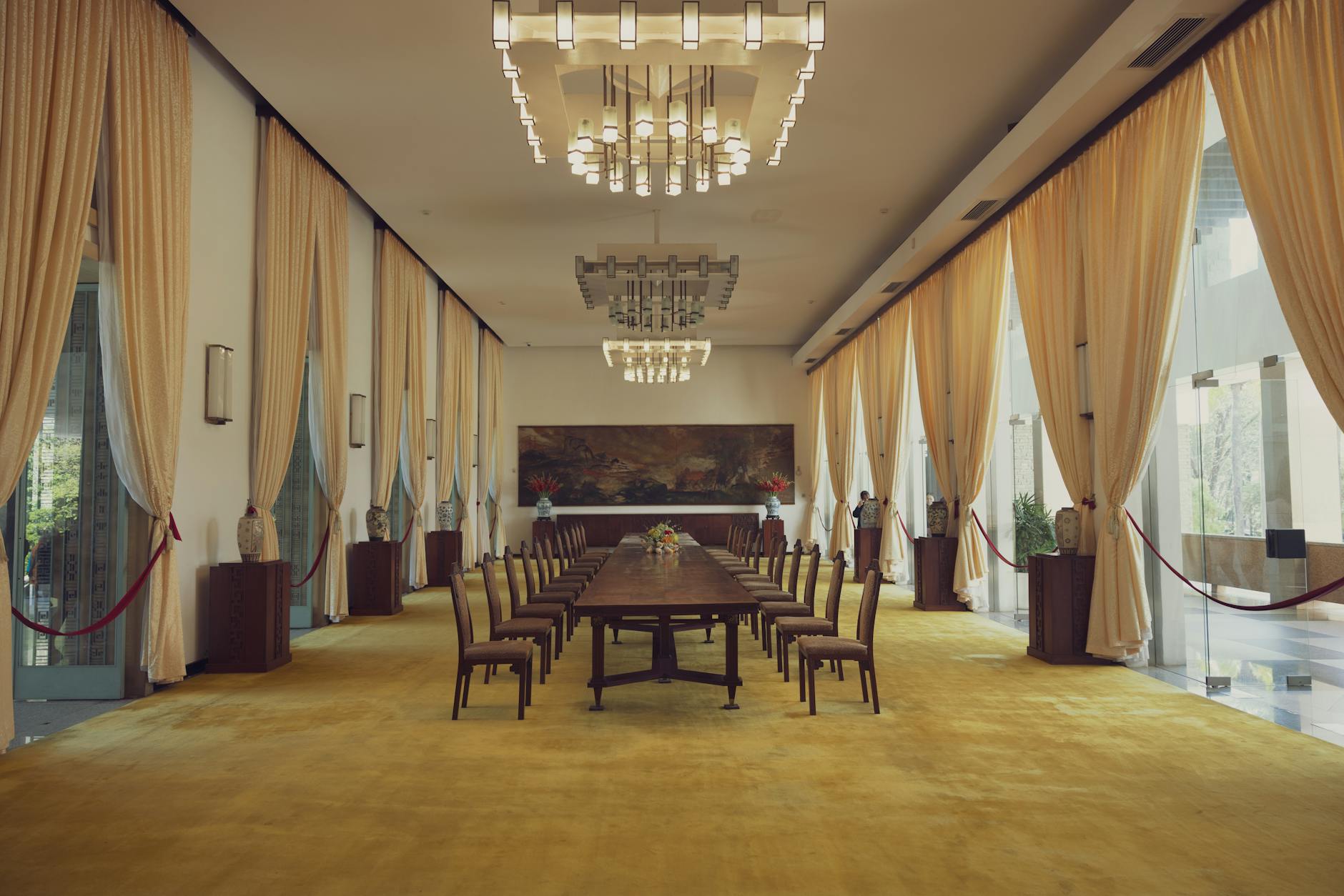 European Union leaders and diplomats sit around a large conference table during emergency talks on the Iran conflict.