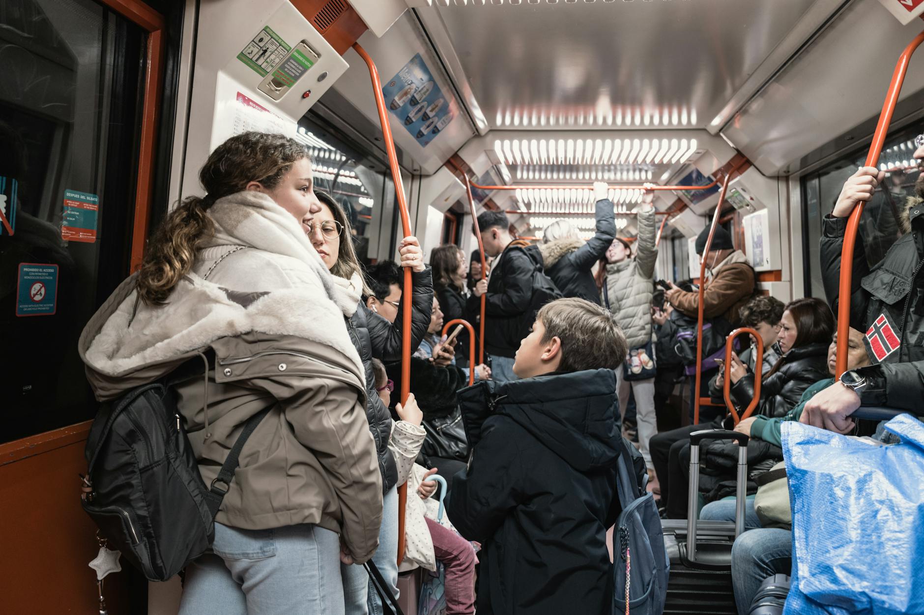 Passengers wait in a largely empty terminal at Berlin Brandenburg Airport during a strike that cancelled all flights.