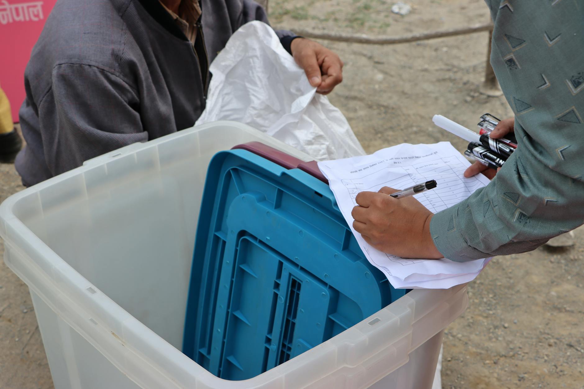 Voters cast ballots at a polling station in Slovenia during a closely contested parliamentary election.