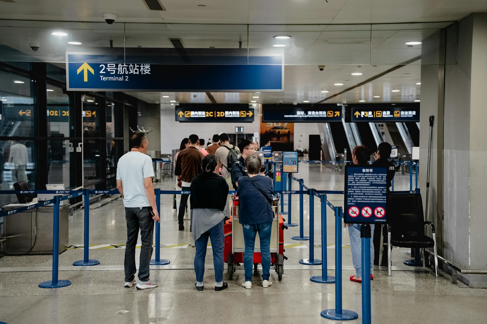 Passengers move through a busy European airport as aircraft are refueled amid concerns over jet fuel supply during the summer travel season.