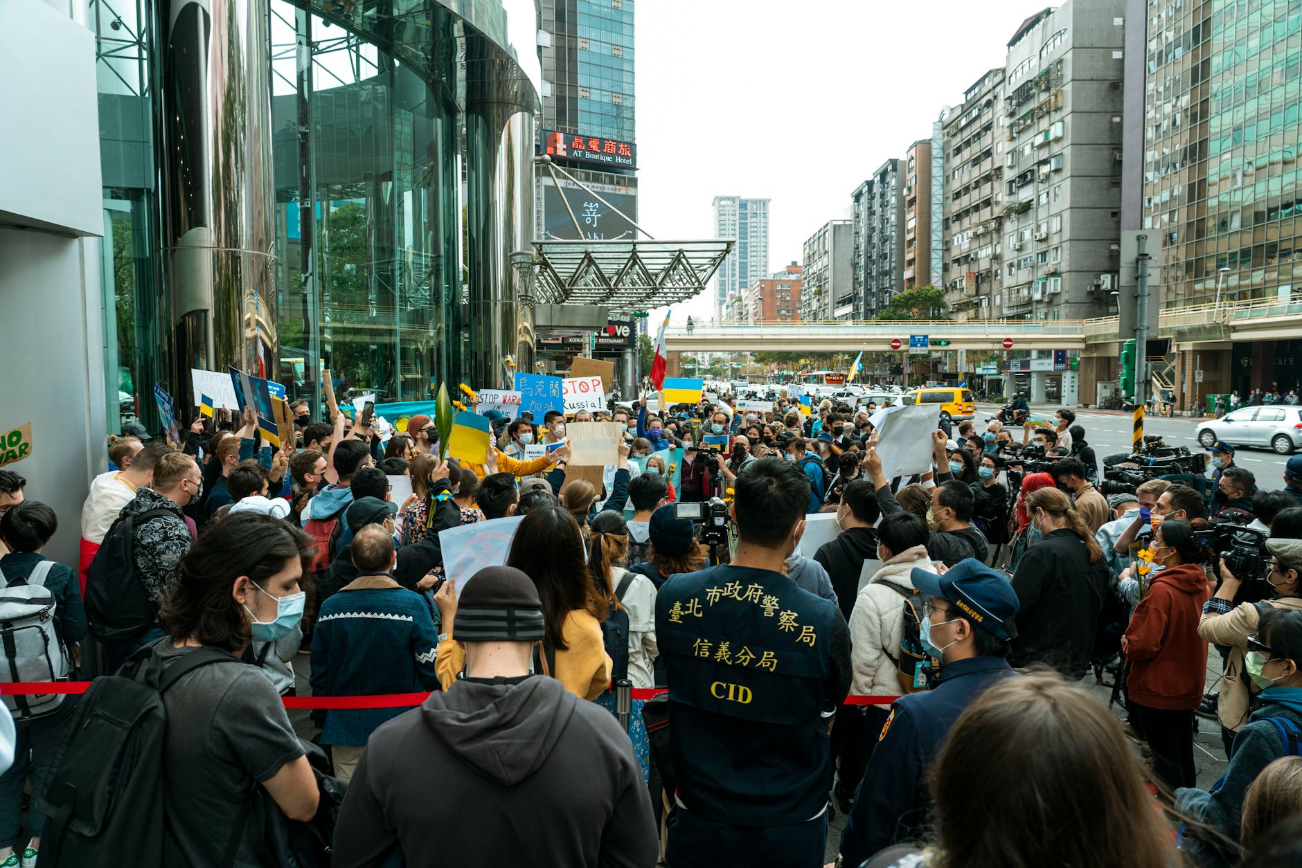 A Eurovision stage in Vienna with crowds gathering as protests over Israel’s participation take place outside the contest venue.