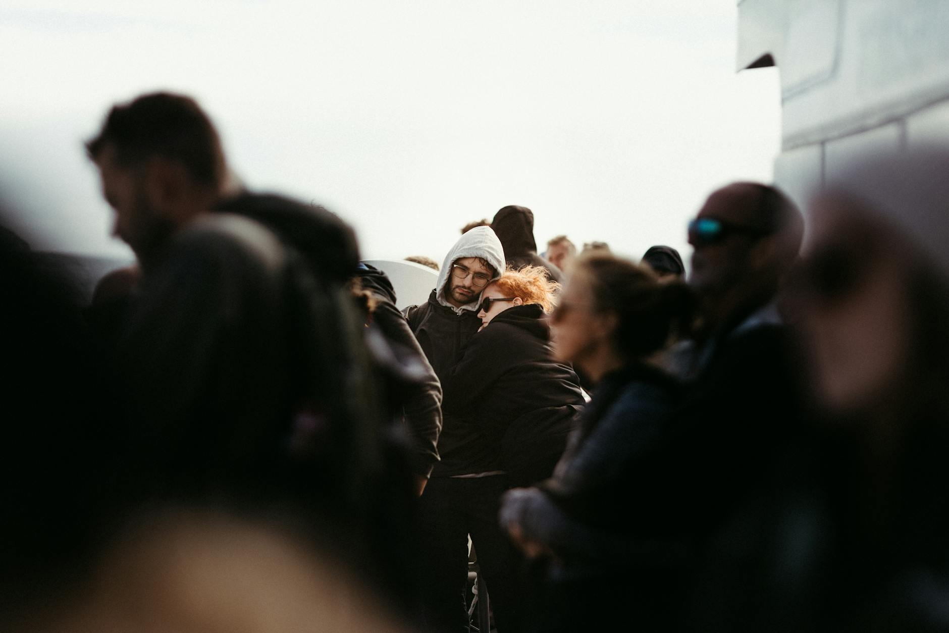 Passengers queue at a European airport border-control area as airlines warn of summer delays linked to biometric Entry/Exit System checks.
