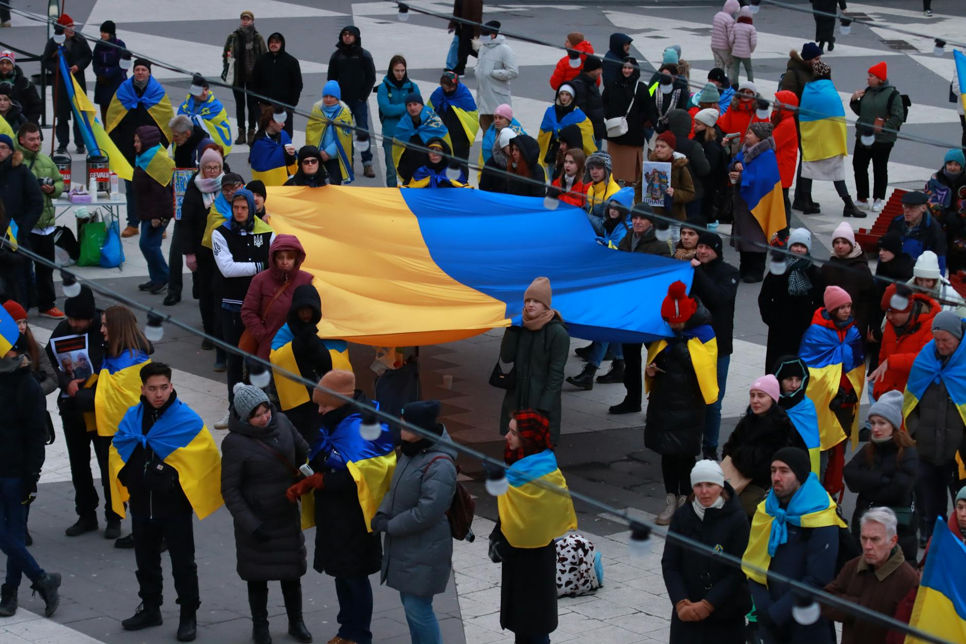 European Union flags stand outside a Brussels institution as leaders discuss Ukraine’s proposed associate membership status.