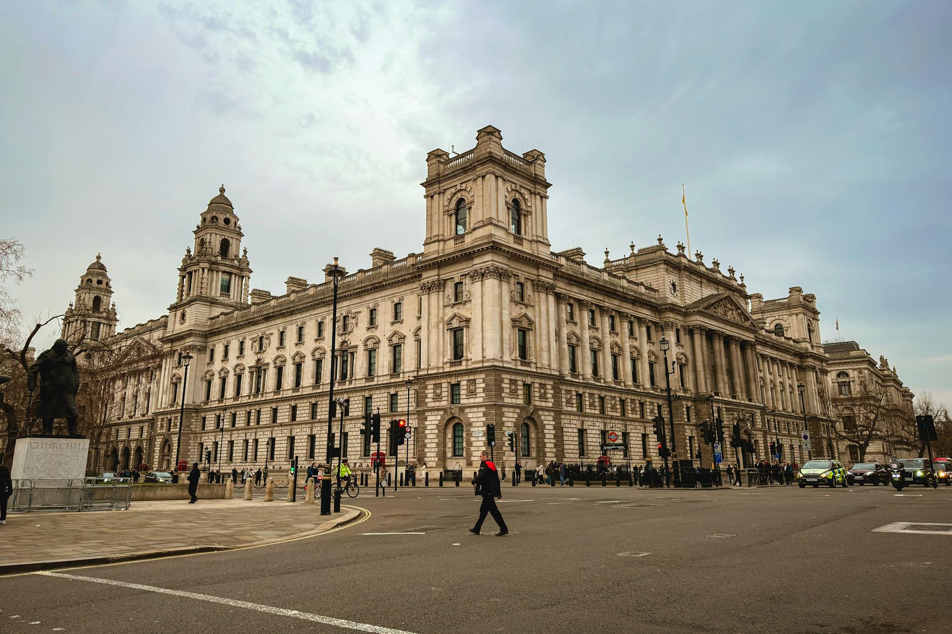 Large crowds of demonstrators march through central London under heavy police presence during separate immigration and pro-Palestinian protests.