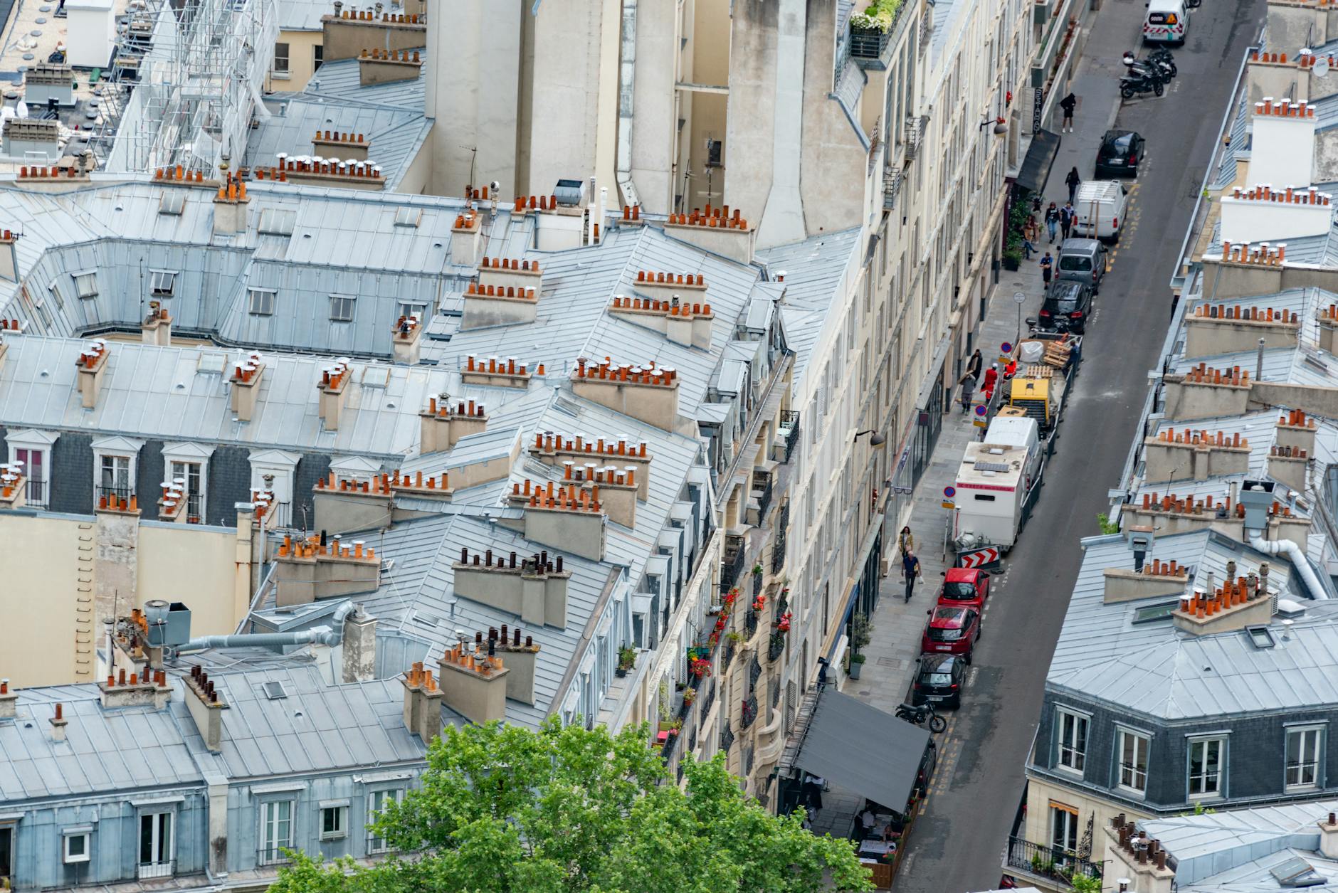 Police officers monitor football supporters in Paris during unrest linked to the UEFA Champions League final.