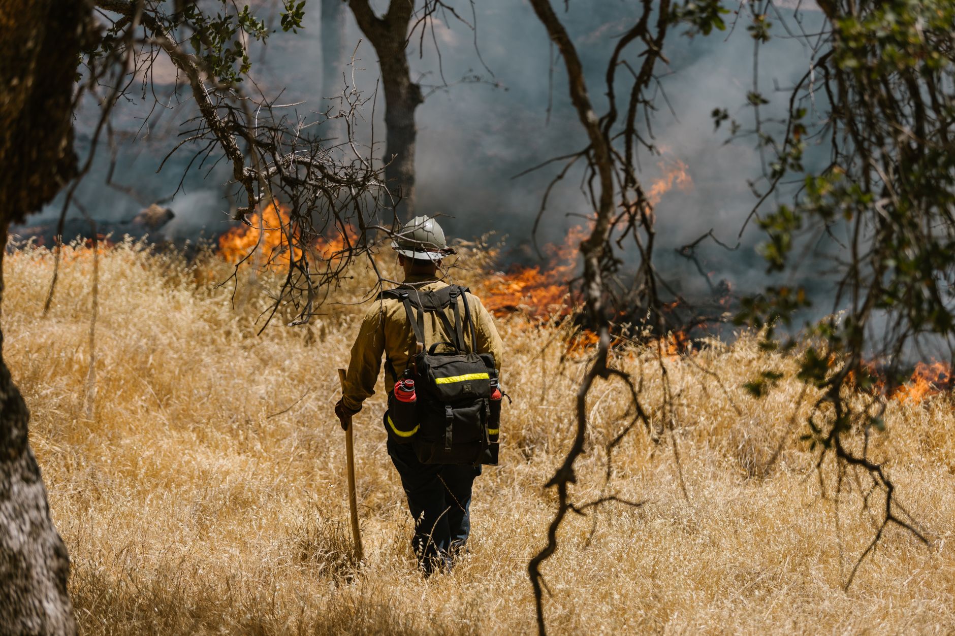 Firefighters confront an advancing wildfire as residents evacuate threatened communities in France and Spain.