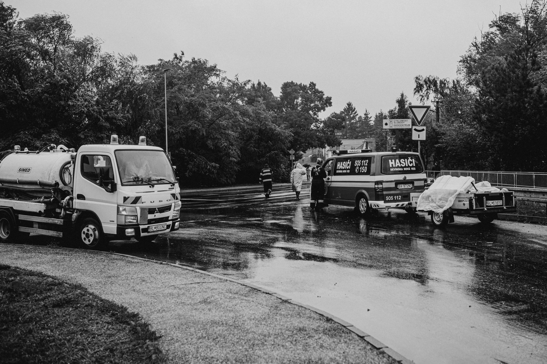 Police and emergency vehicles stand outside a supermarket in Berlin after officers ended an overnight hostage standoff.