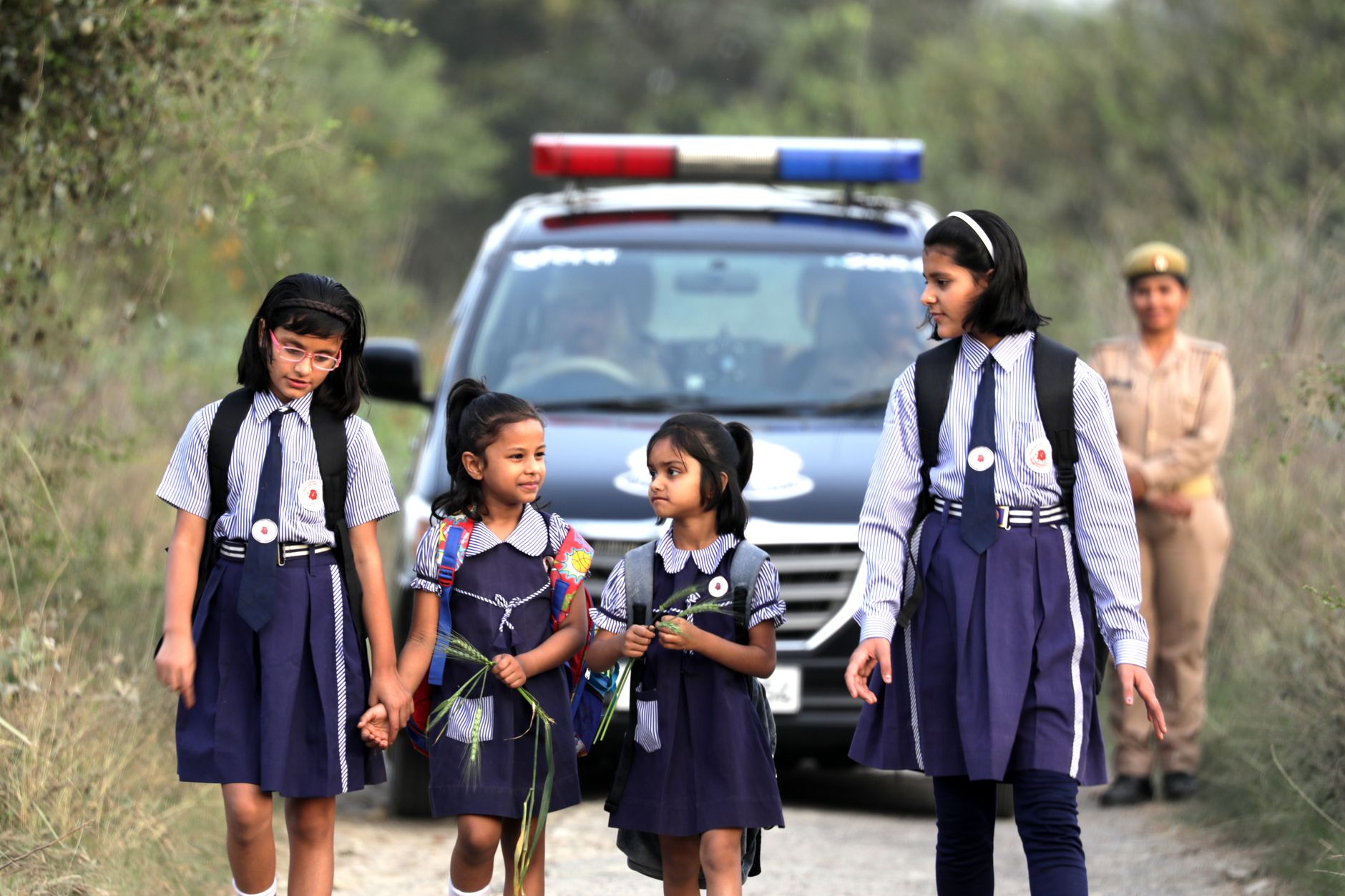 Polish police and security personnel respond to heightened concerns around schools following a series of violent attacks.